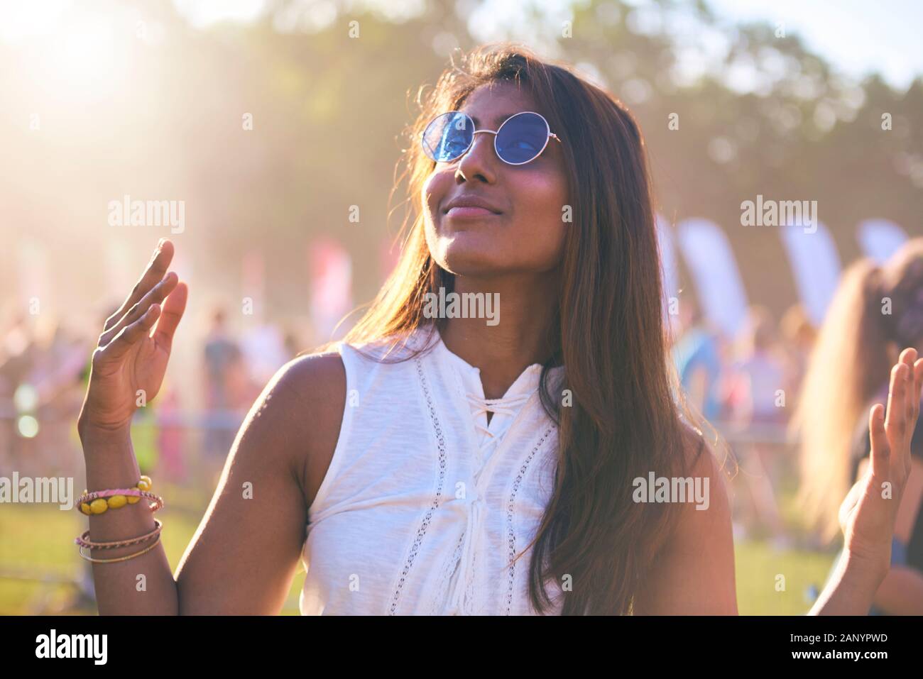 Happy African woman dancing at festival Stock Photo - Alamy