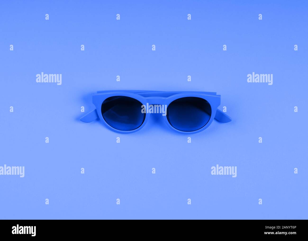 Classic blue sun glasses. Monochrome fashion flat Stock Photo