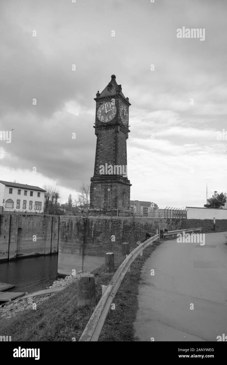 the clock tower on a cloudy day in a black and white Stock Photo