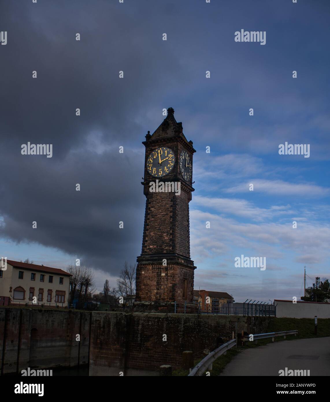 wether duality divided by a clock tower Stock Photo