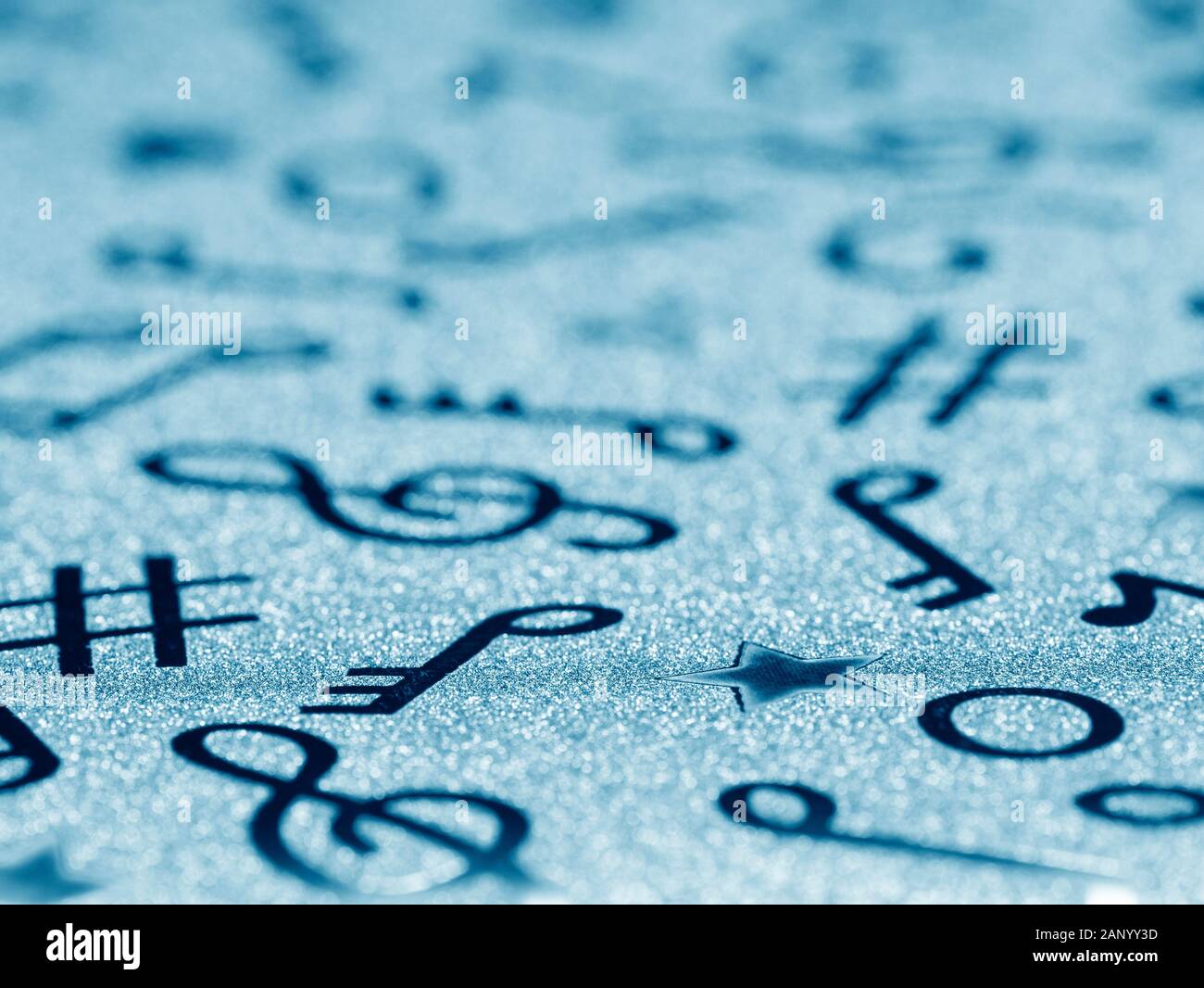 Blue glitter music background. Selective focus Stock Photo