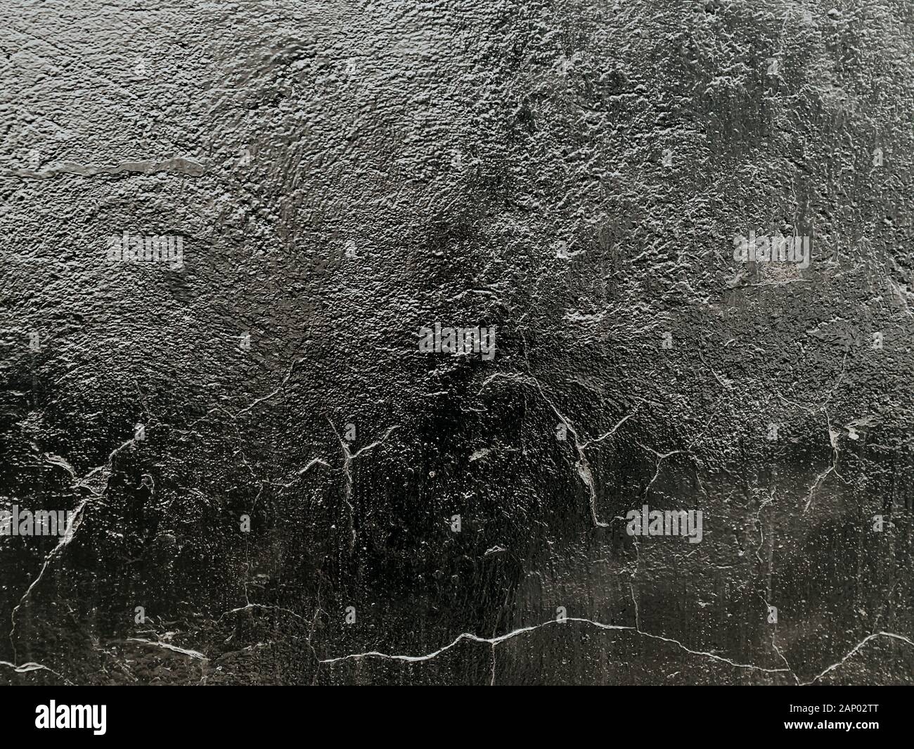 black vintage loft wall stone structure as background Stock Photo - Alamy
