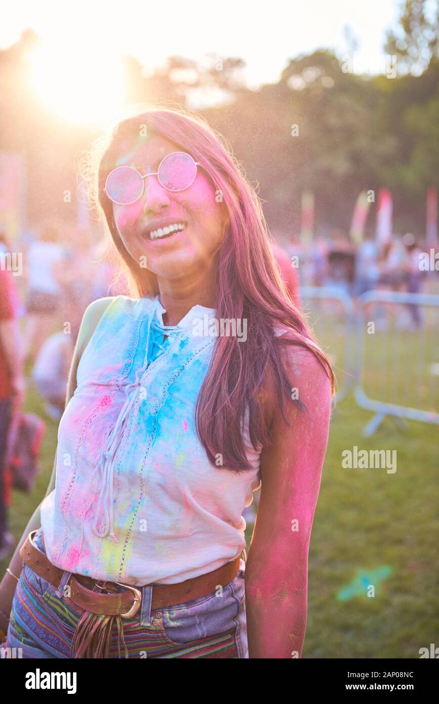 Beautiful African woman in holi colors at the party Stock Photo