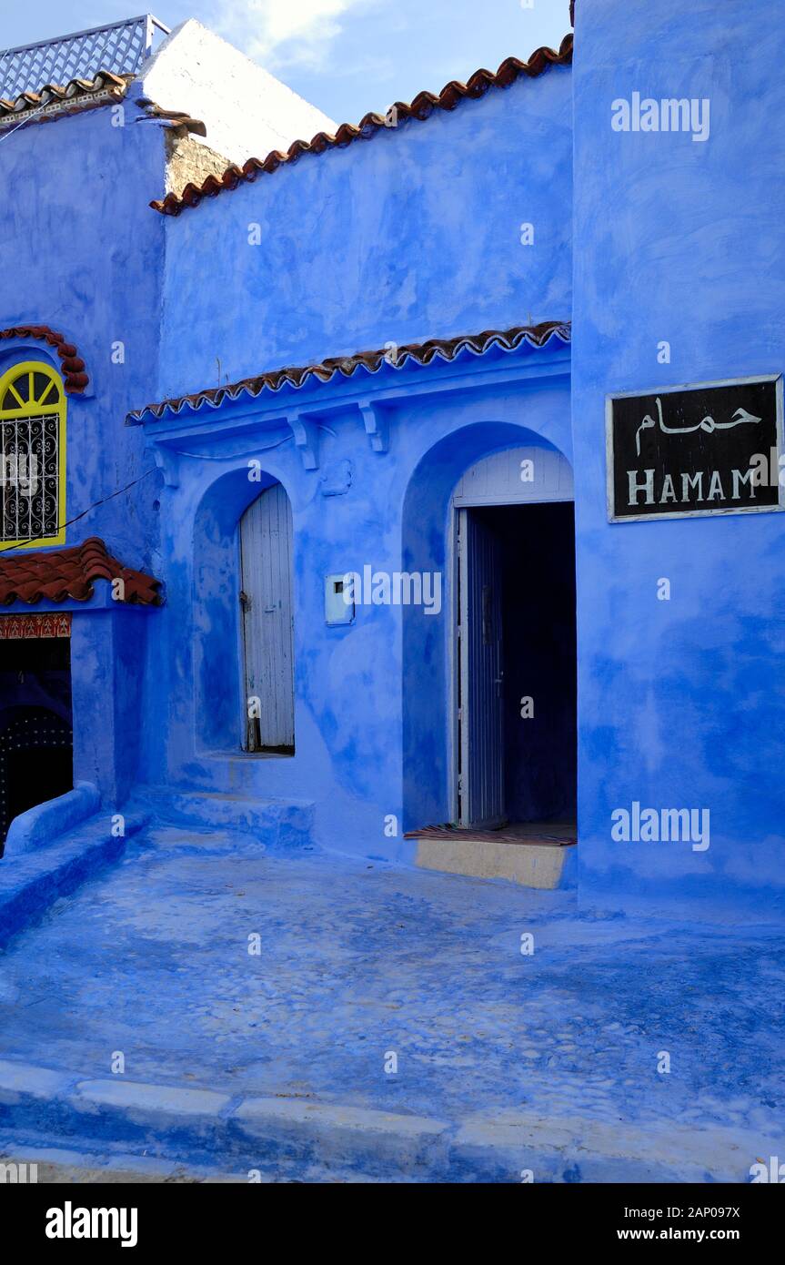 Traditional Blue Architecture & Entrance to Blue Hamam in the Medina or Old Town Chefchaouen or Chaouen Morocco Stock Photo