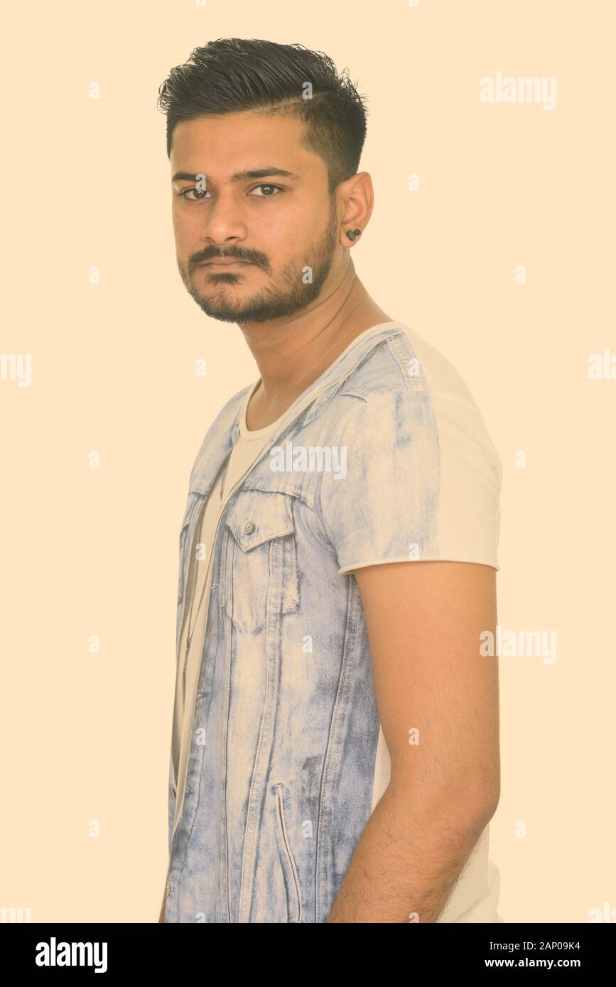 Portrait Of Young Handsome Bearded Indian Man Stock Photo Alamy