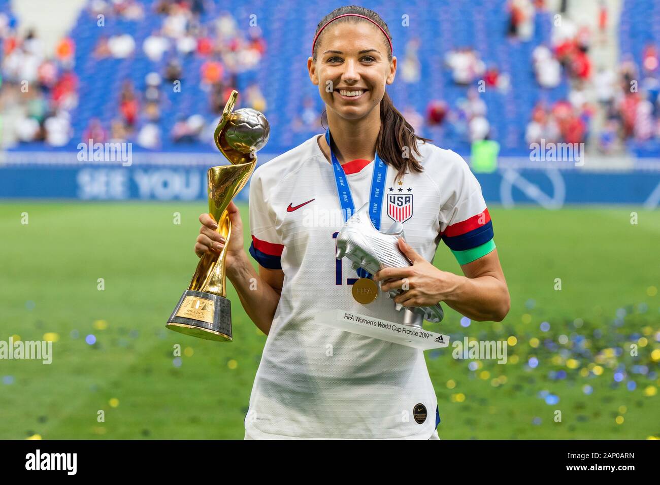 Alex Morgan of the USA women's national team celebrating with trophy and the second best scorer in the tournament award after the 2019 FIFA Women's World Cup Final match between The United States of America and The Netherlands at Stade de Lyon.(Final score; USA - Netherlands 2:0) Stock Photo