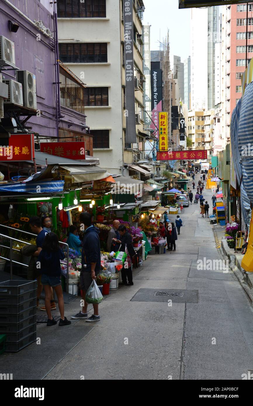A street market selling flowers in the Mid Levels Neighborhood of Hong Kong. Stock Photo