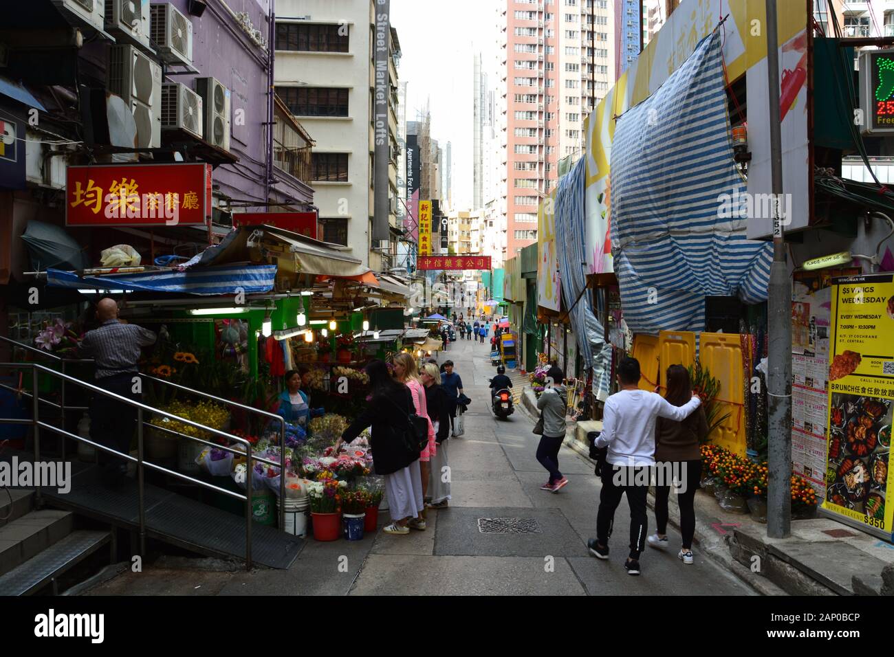 A street market selling flowers in the Mid Levels Neighborhood of Hong Kong. Stock Photo