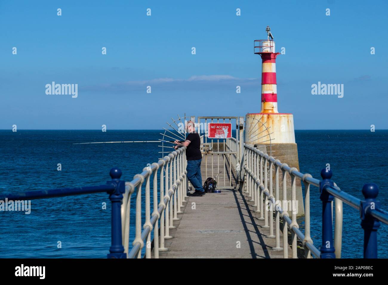 Sea fishing from a pier. Stock Photo