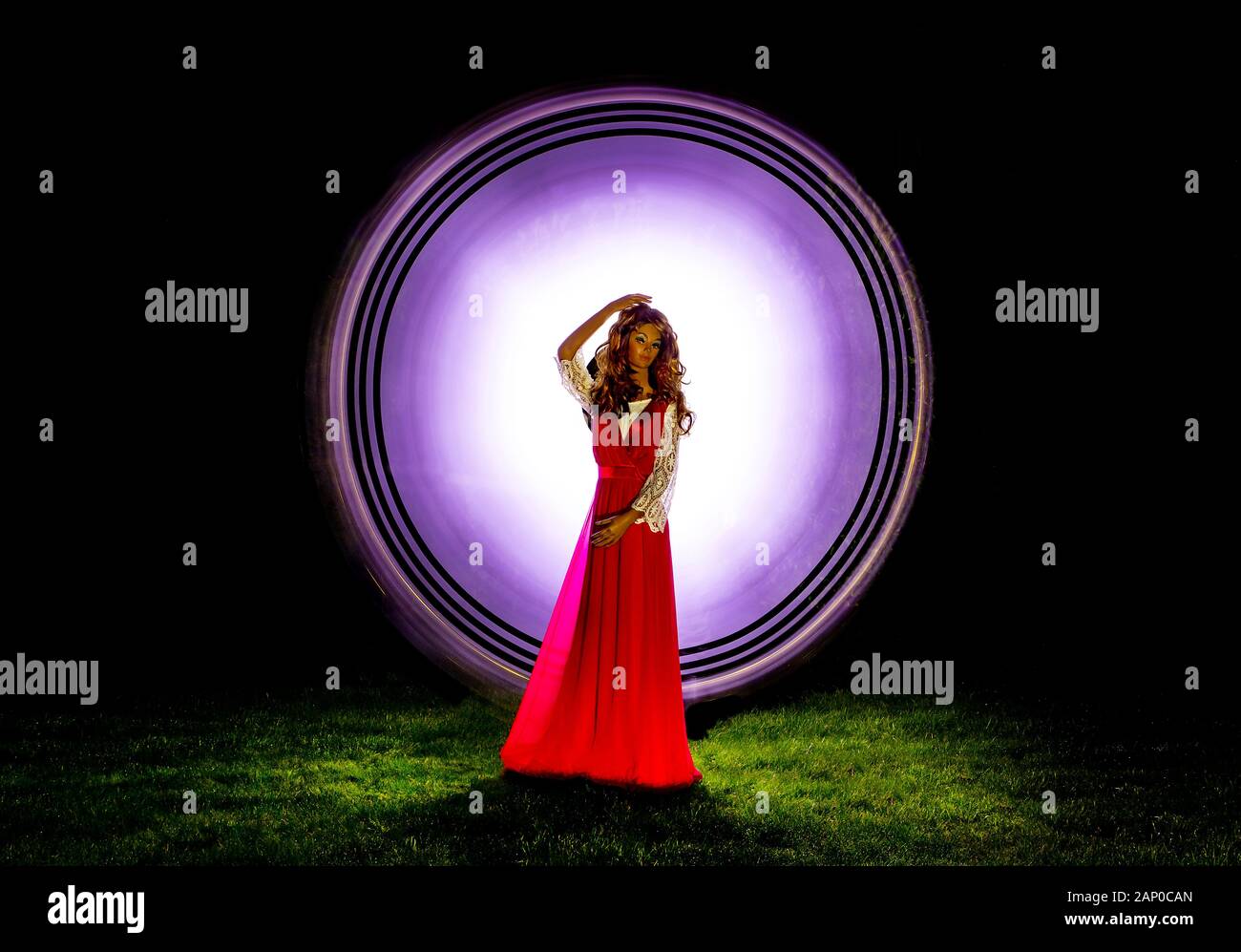 HIGH CONTRAST VIVID COLOUR ABSTRACT BACKGROUND CREATED BY LIGHT PAINTING -SCIENCE FICTION, DYNAMIC MOVEMENT,ARTISTIC MERIT WITH MANAKIN Stock Photo
