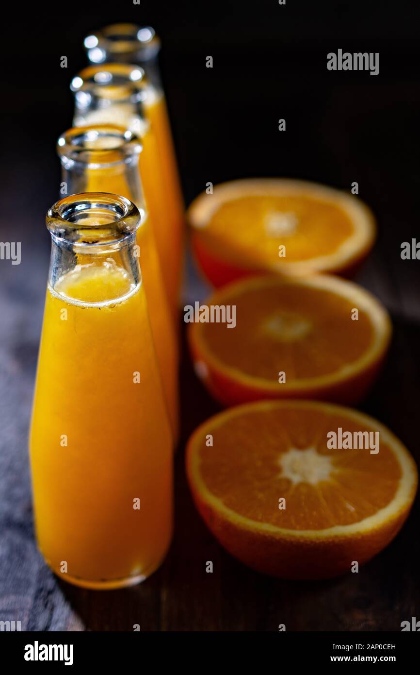 Fresh orange juice in bottles.Healthy vitamins.Fit fruit. breakfast.Sugar free.Delicious food Stock Photo