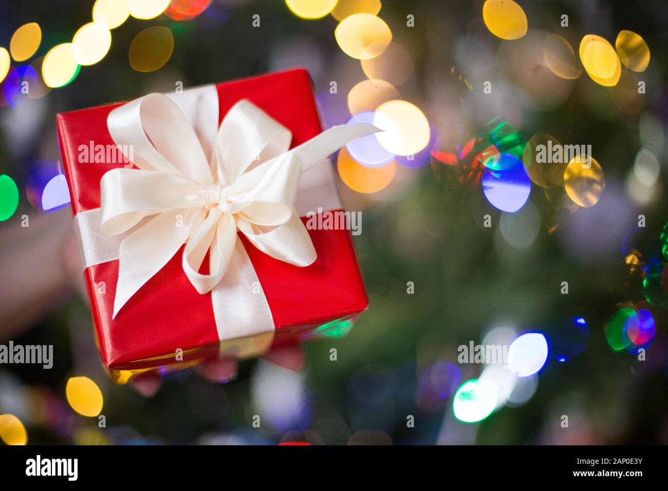 gift - red box with a gift for the holidays Stock Photo