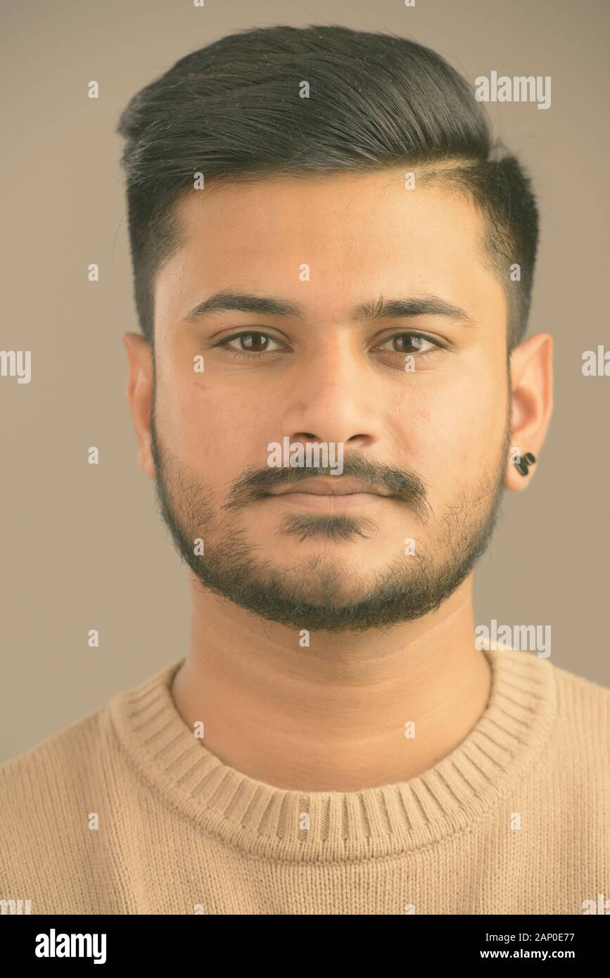 Indian man earring hi-res stock photography and images - Alamy