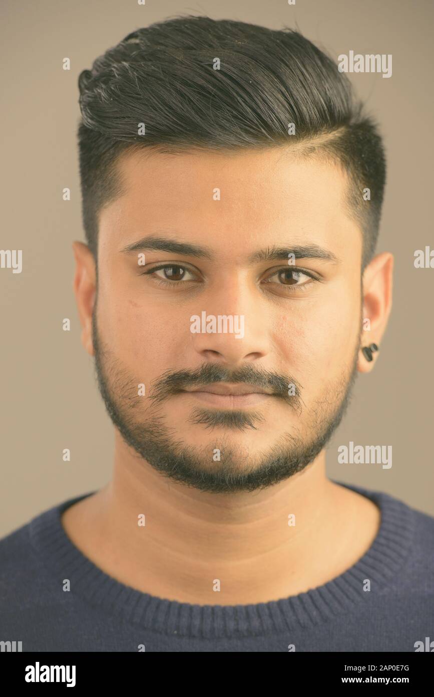 Face of young handsome bearded Indian man Stock Photo - Alamy Face of young handsome bearded Indian man Stock Photo - Alamy