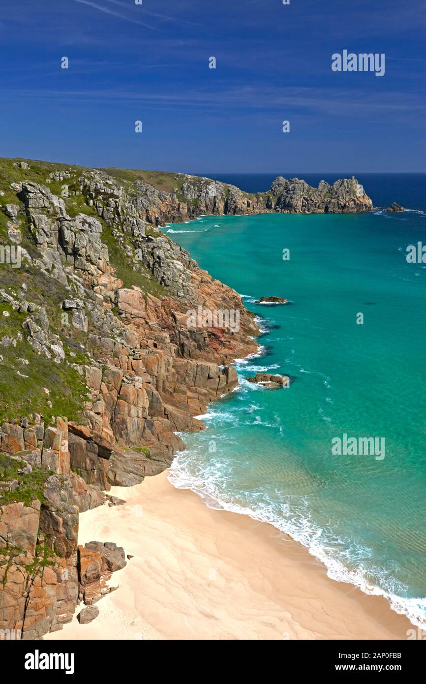 Treen cliffs and Pednvounder beach near Porthcurno on the Cornish coast. Stock Photo