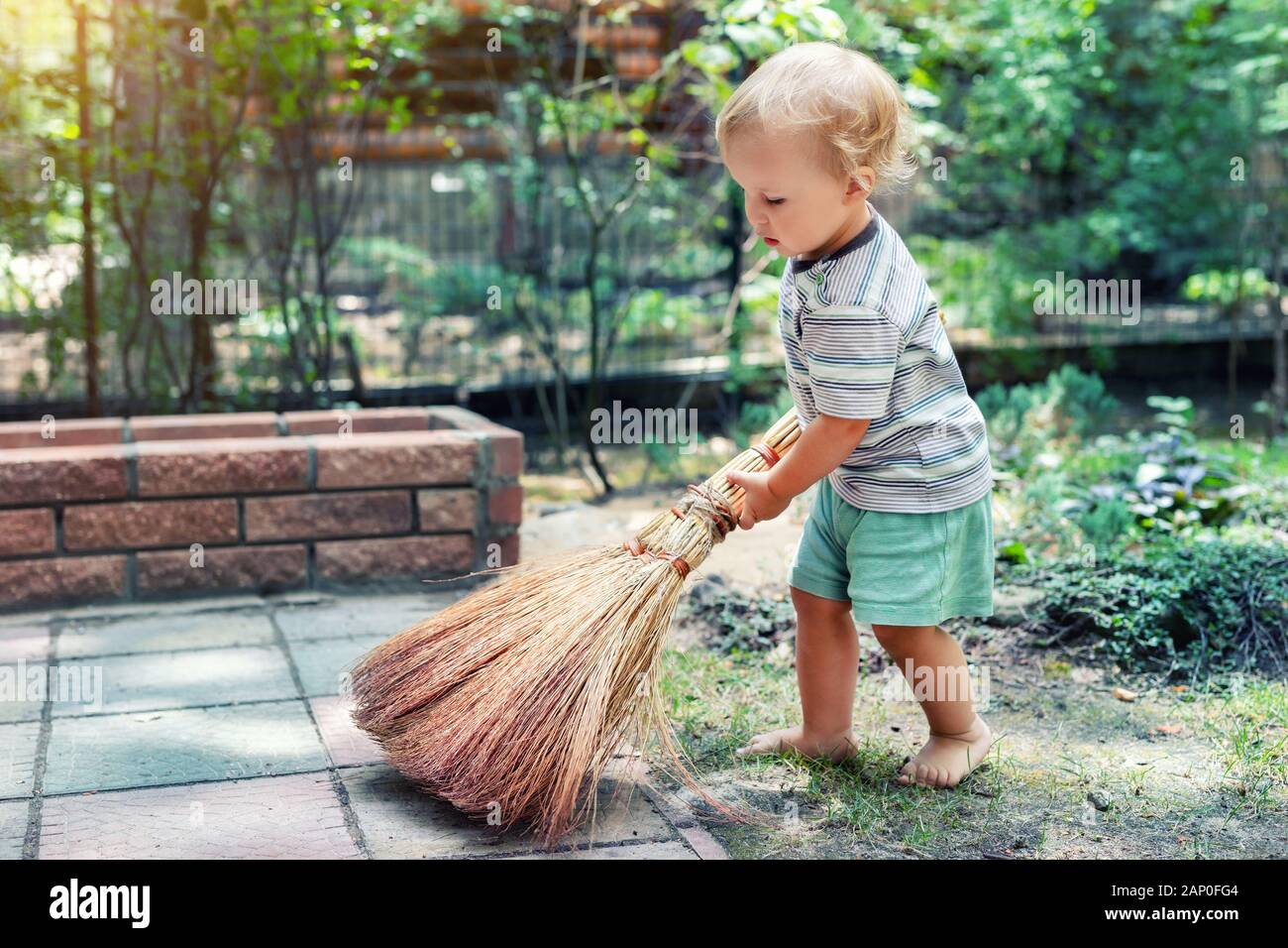 Girl Broom Sweep High Resolution Stock Photography and Images - Alamy