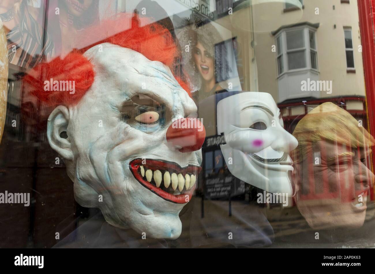 Masks in window of The Joke Shop in Scarborough. Stock Photo