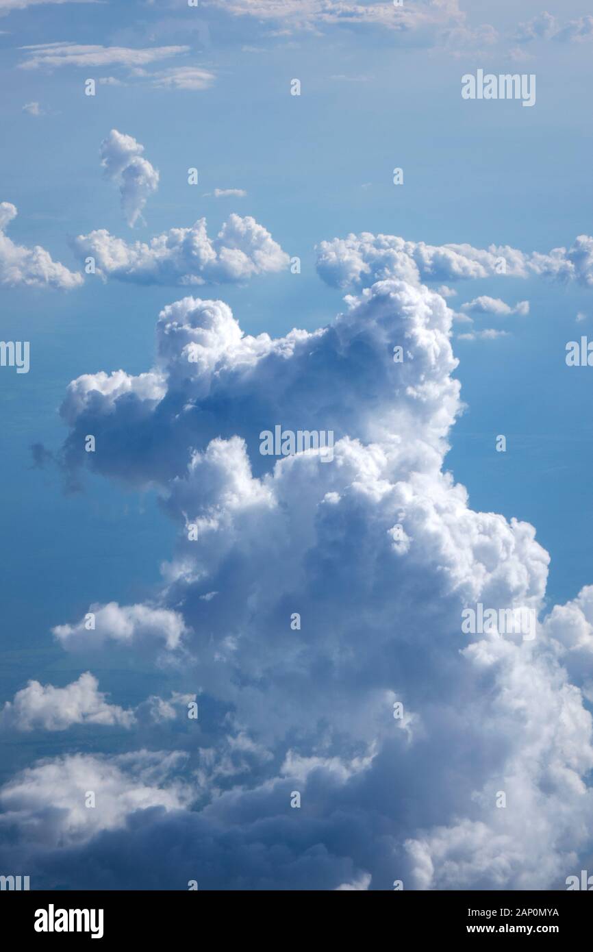Vertical Background Of Big Clouds In A Blue Clear Sky Stock Photo Alamy