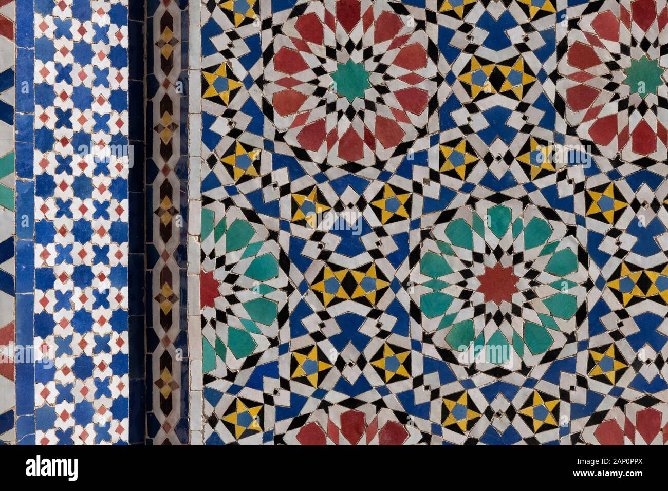 Traditional abstract Moroccan tile mosaic background. Architectural detail of the royal palace in Fes, Morocco. Stock Photo