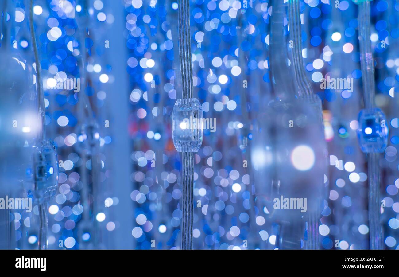 multicolored city led lights beams Stock Photo