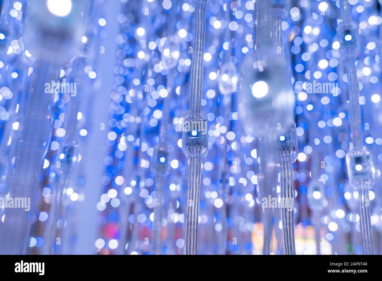 multicolored city led lights beams Stock Photo