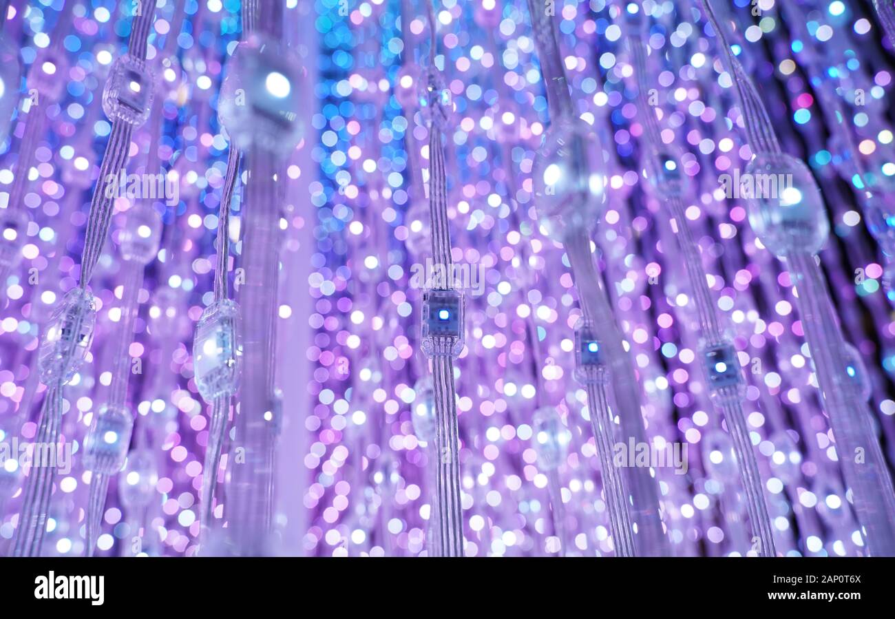 multicolored city led lights beams Stock Photo