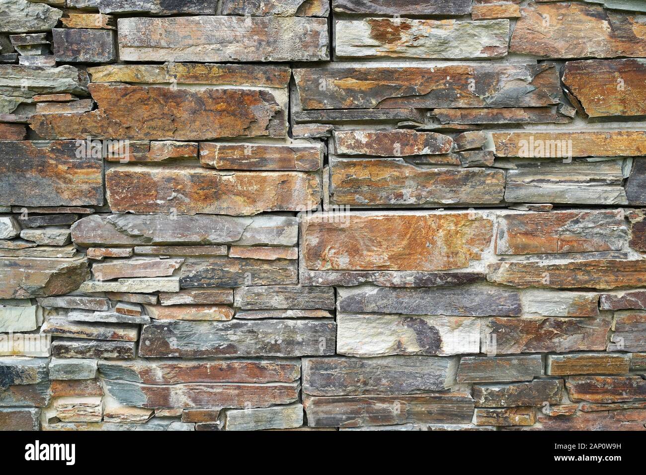 Stone wall composed of stones of various shapes,Natural background ...