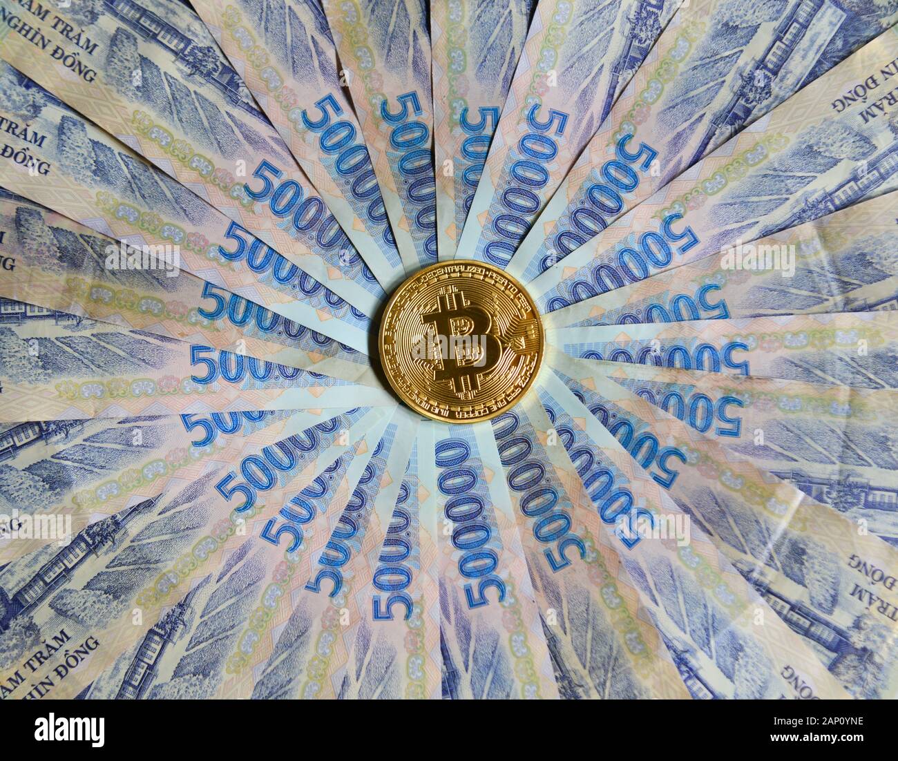 A golden bitcoin on Vietnamese billnotes (500,000 VND) background Stock  Photo - Alamy