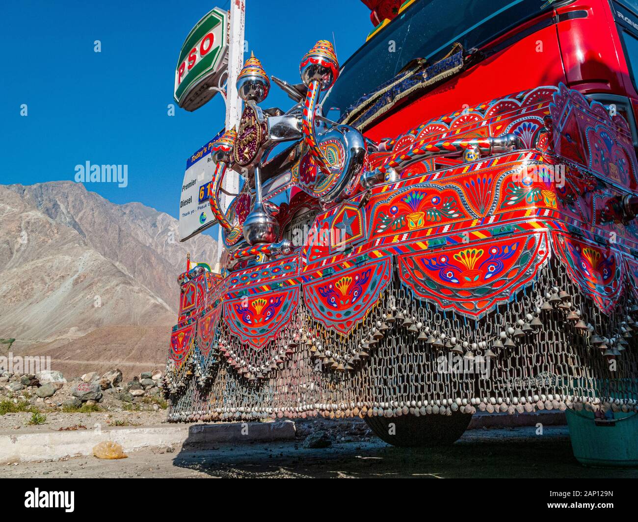 Detail of colorfully decorated and painted trucks, driving on the dusty roads of Karakorum Highway Stock Photo