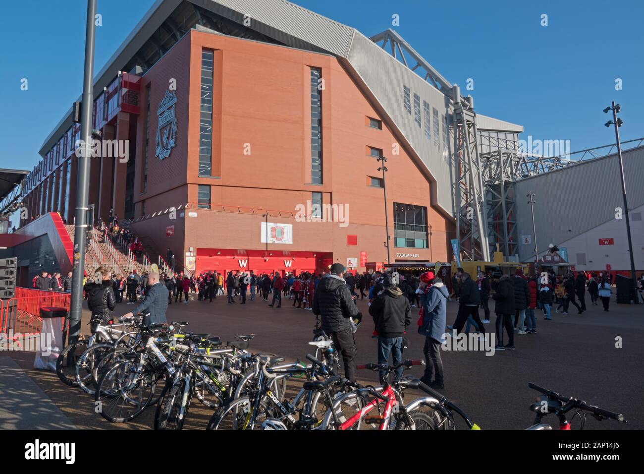 Liverpool fans gather in the fan park prior to a Premier League game at Anfield against Man Utd. Stock Photo