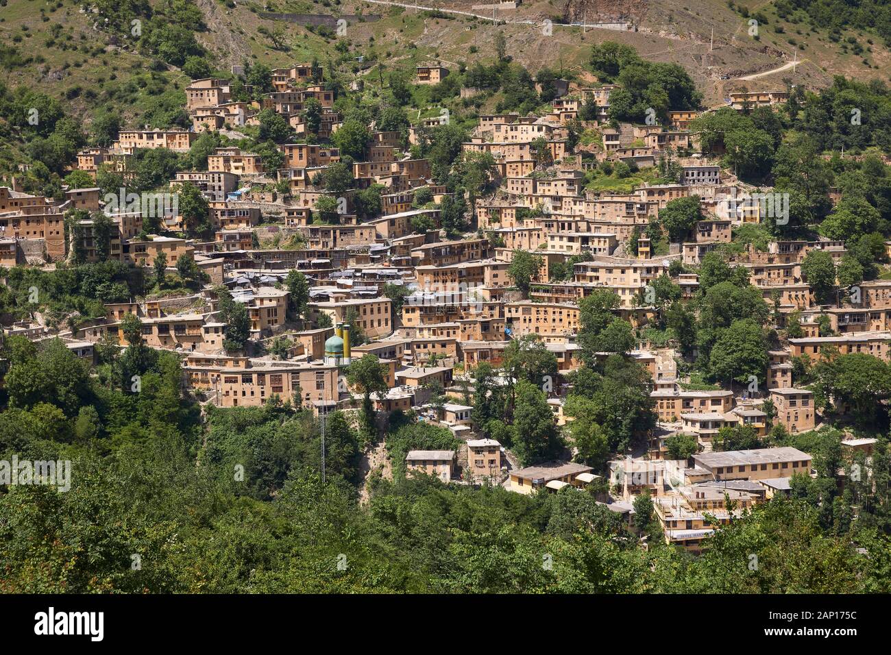The mountain village of Masuleh in the Elburs Mountains in northern Iran, taken on May 28, 2017. The village is built like a terrace into the very steep slope. The roofs are usually flat or only slightly inclined and often also serve as footpaths for the upper house level above. Due to the unusual architecture of the houses, the place is a tourist attraction. | usage worldwide Stock Photo