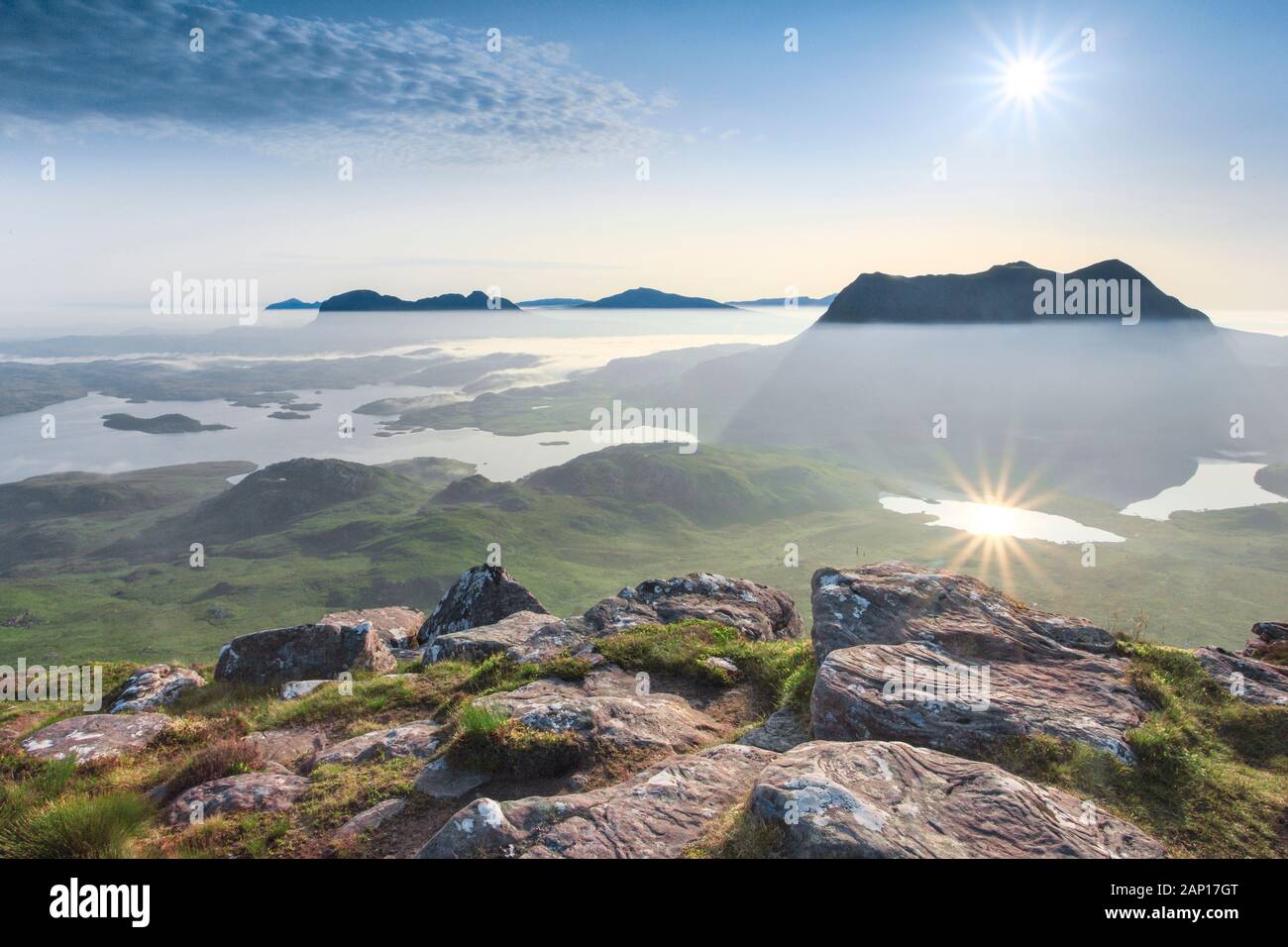view-of-the-mountains-suilven-and-cul-mor-at-sunrise-as-seen-from-stac