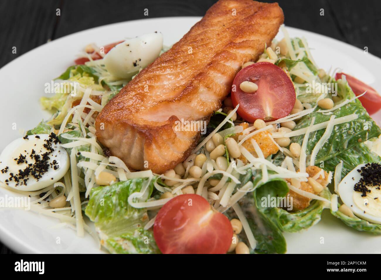 Grilled salmon caesar salad Stock Photo Alamy
