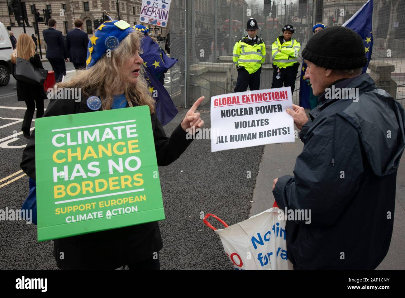 Brexit protesters discuss climate change and nuclear power in Westminster outside Parliament on 8th January 2020 in London, England, United Kingdom. With a majority Conservative government in power and Brexit day at the end of January looming, the role of these protesters is now to demonstrate in the hope of the softest Brexit deal possible. Stock Photo