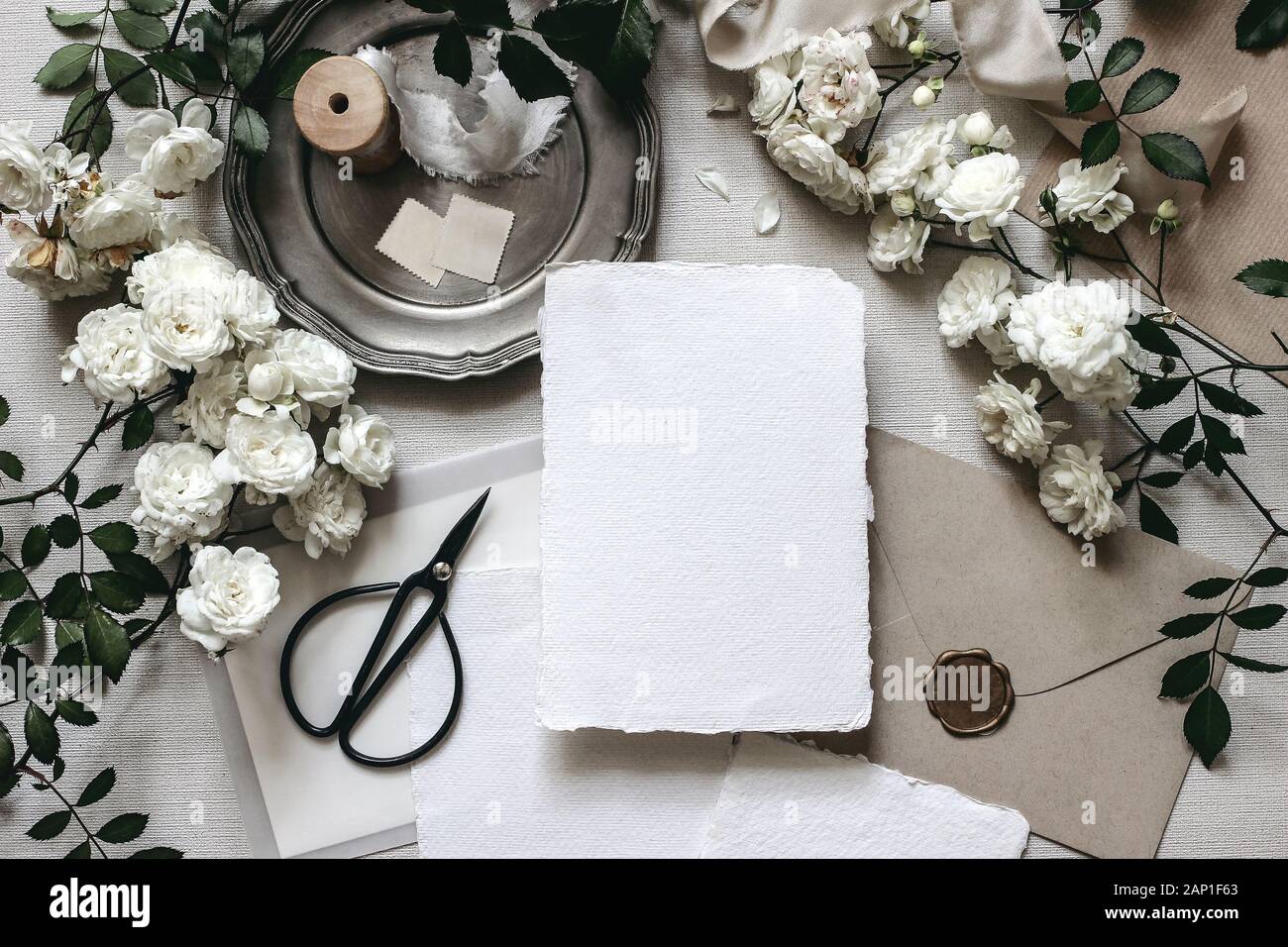 Download Moody Wedding Table Mockup Scene Stationery Composition With Fading White Rose Flowers Silver Plate Black Scissors Envelopes And Blank Greeting Ca Stock Photo Alamy