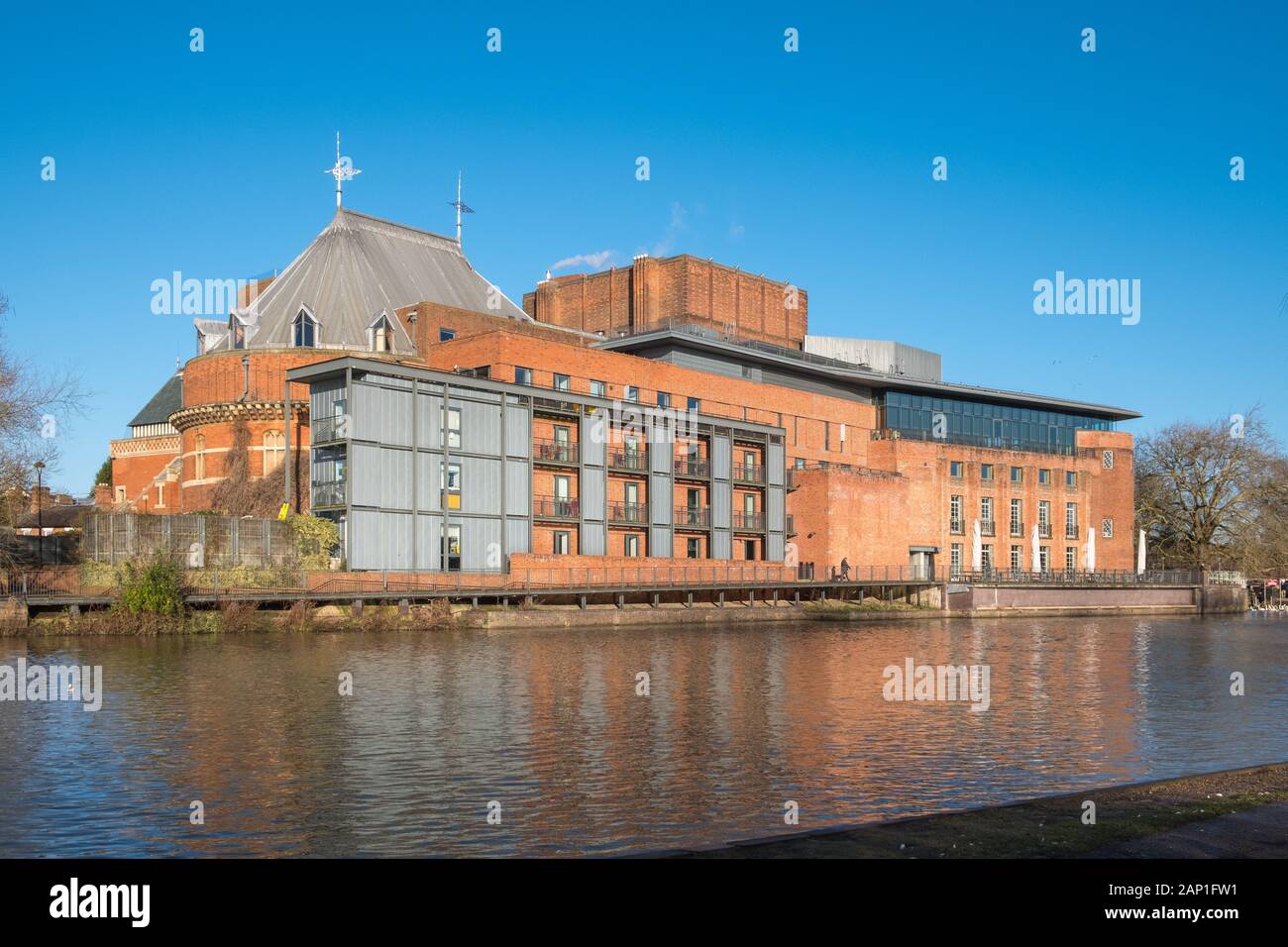 The Royal Shakespeare Theatre on the bank of the River Avon on Stratford-upon-Avon, Warwickshire, UK Stock Photo