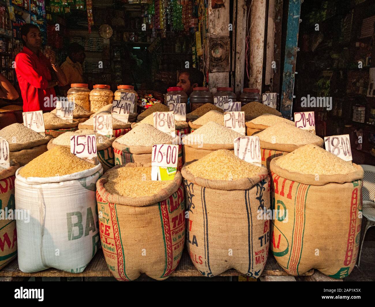 Various sorts of rice are sold at the spice wholesale market Stock