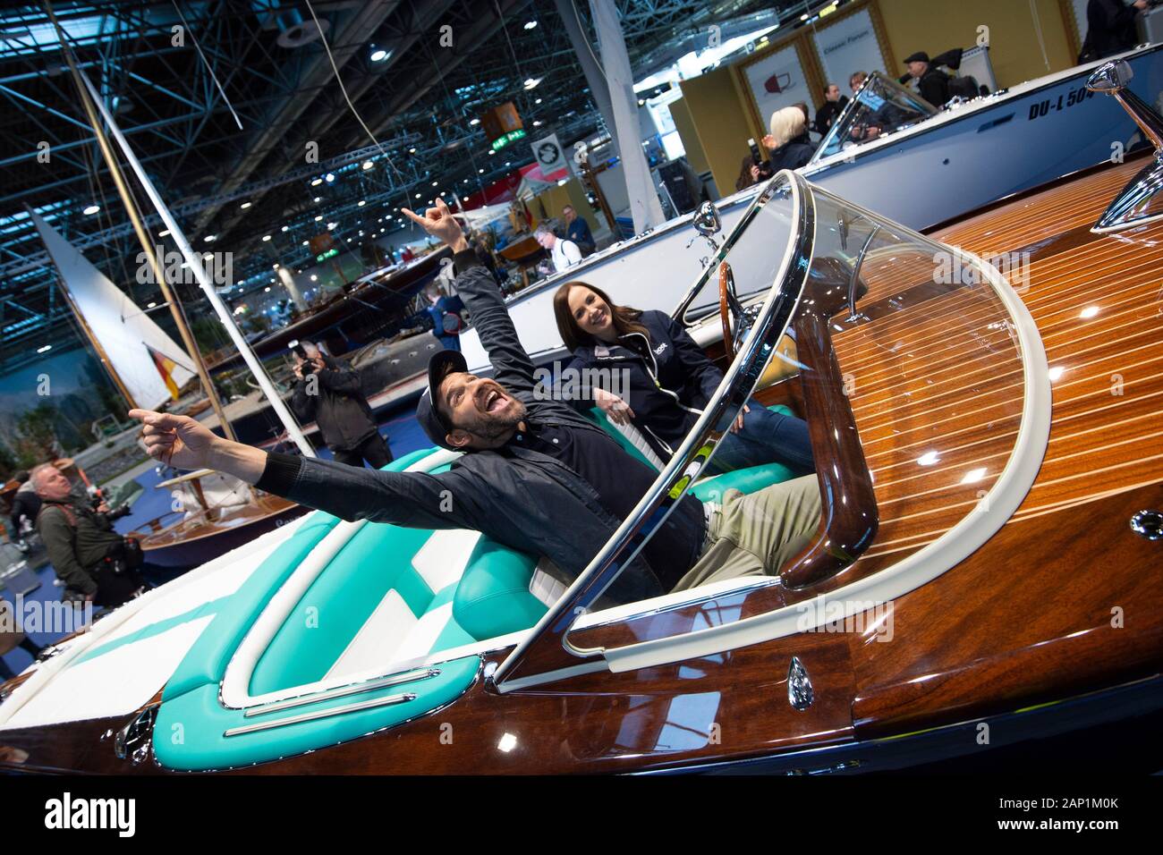 Boot models Lutz and Miriam pose in a historic wooden motorboat at the  Classic Forum, Messe Boot 2019 in Duesseldorf from January 18 to 26, 2020,  January 17, 2020. Â | usage worldwide Stock Photo - Alamy