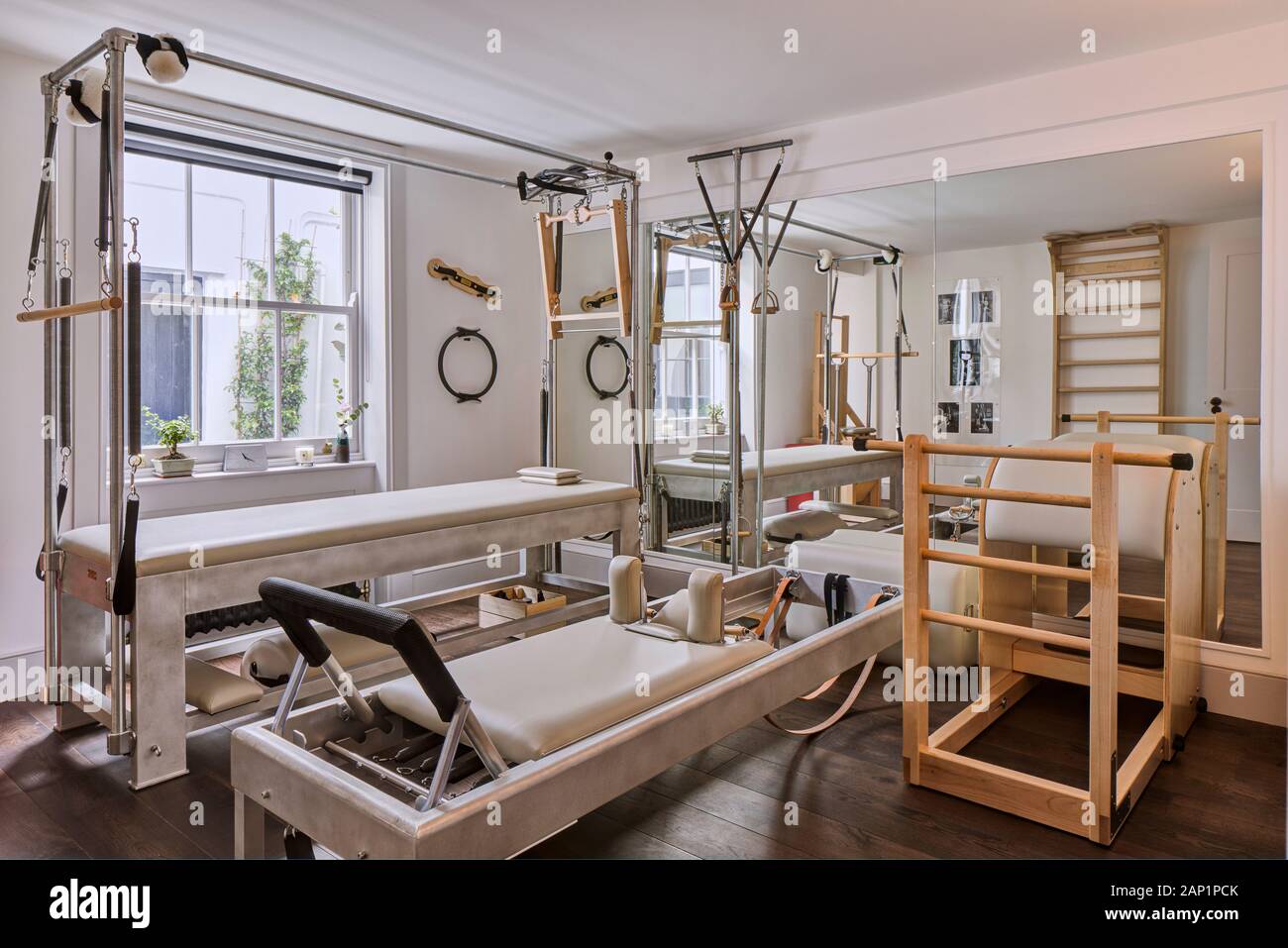 Main room with equipment. Zed Pilates Studio, London, United Kingdom. Architect: N/A, 2019. Stock Photo