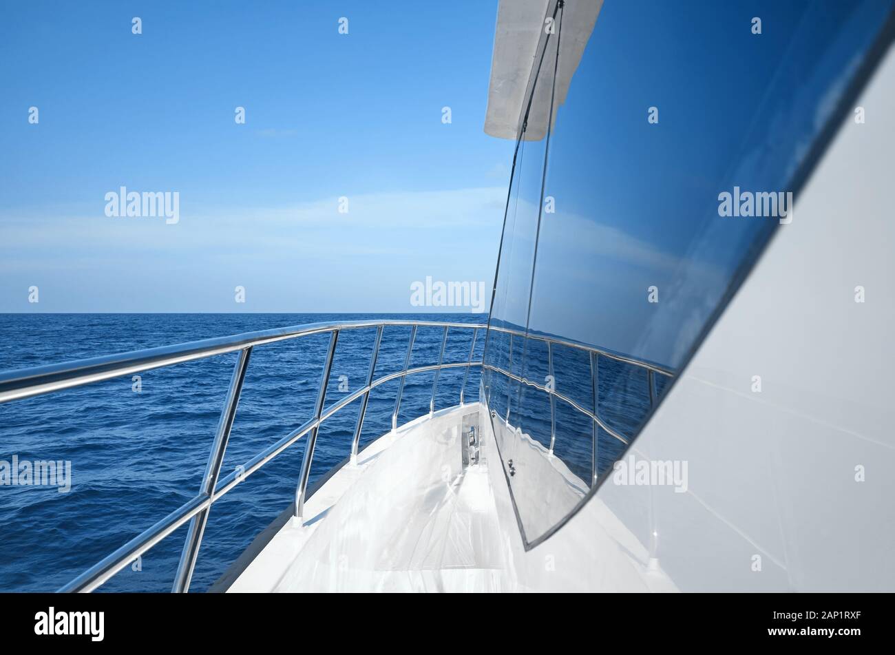 Modern boat side and railing on a sunny day, luxury travel concept. Stock Photo