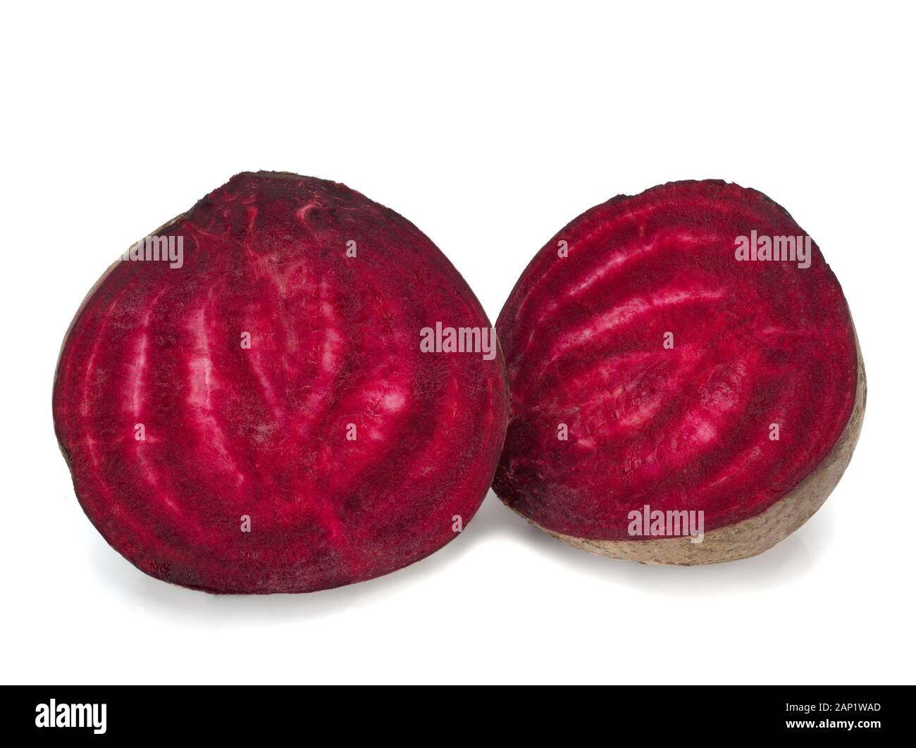 Two halfs of red beetroot isolated on white background Stock Photo