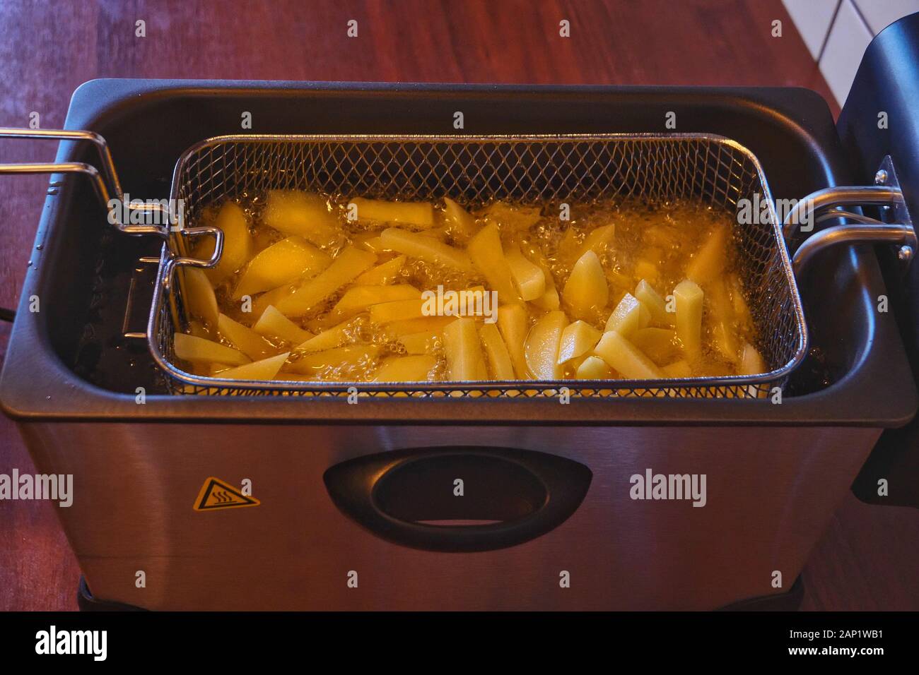 French Fries with Electric Friteuse Stock Photo Alamy