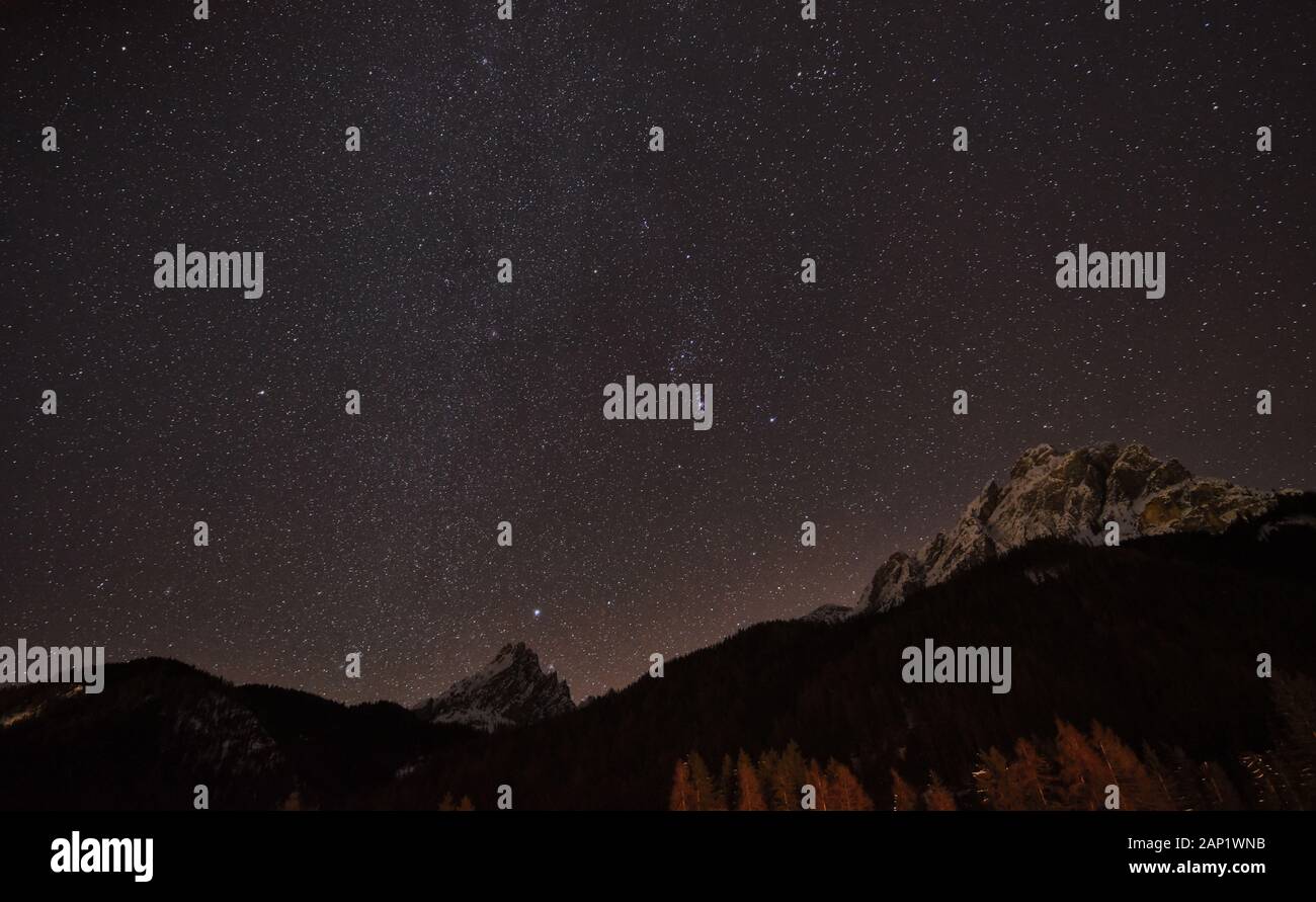 Starry night sky over the Vallandro and Herrstein peak Stock Photo