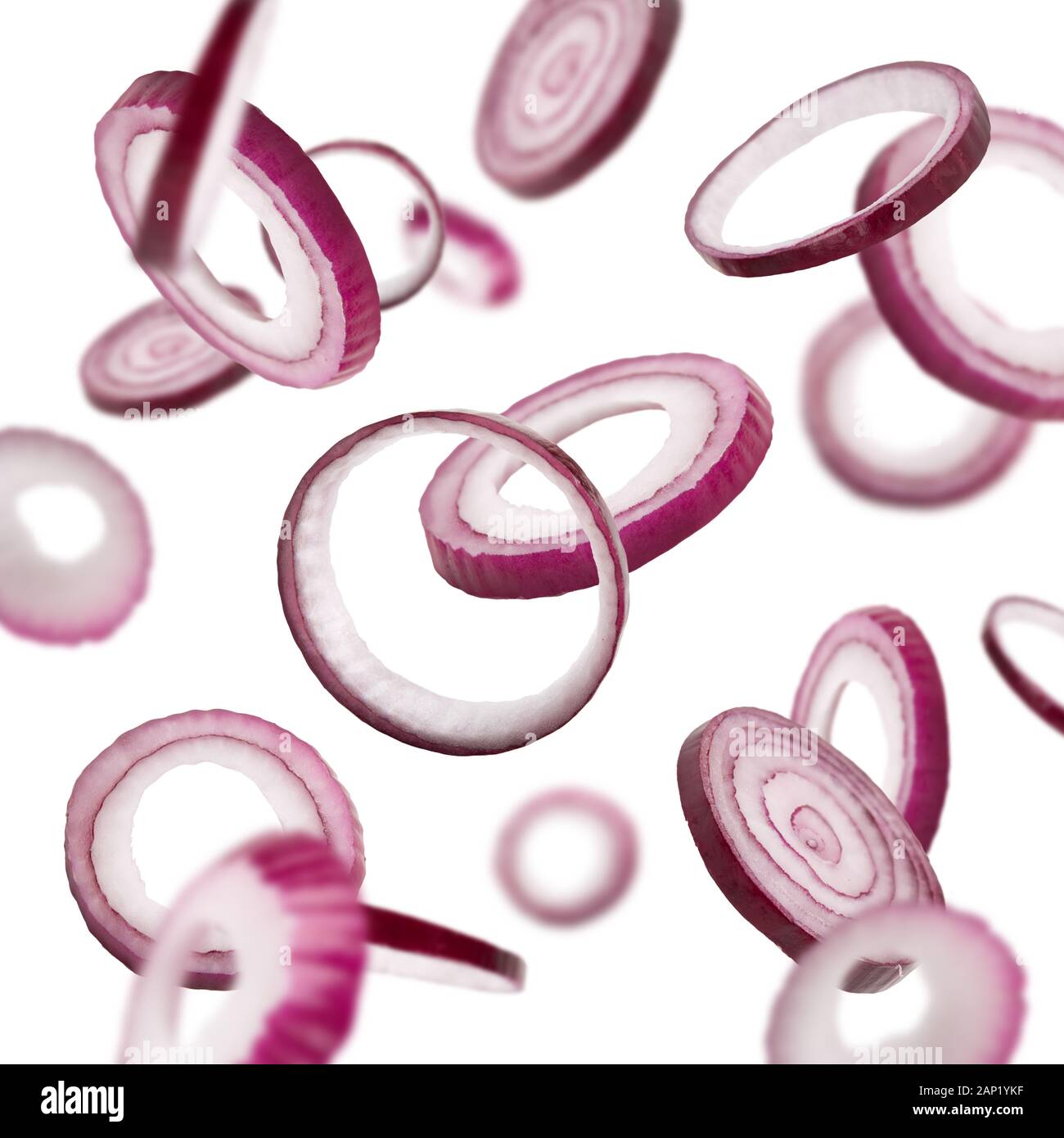 Fresh flying onion over white background, isolated Stock Photo
