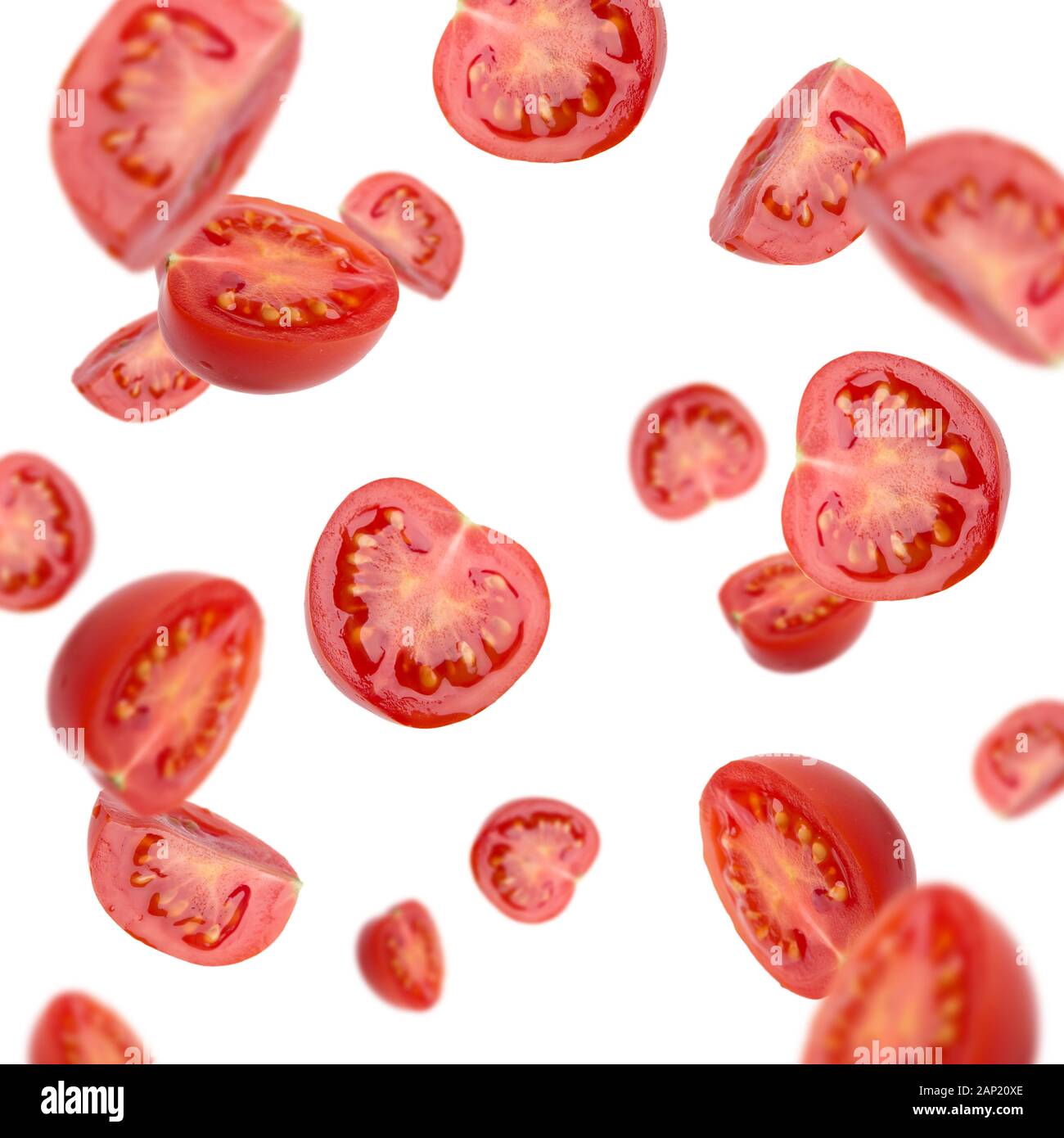 Flying red tomato slices isolated on white background Stock Photo - Alamy