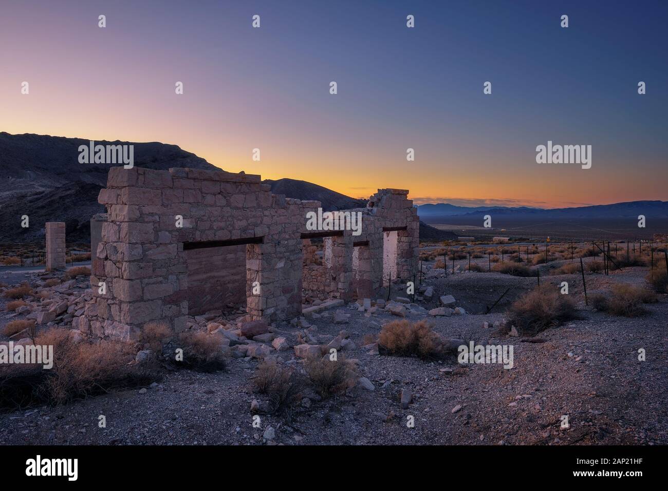 Sunrise above ruined building in Rhyolite, Nevada Stock Photo