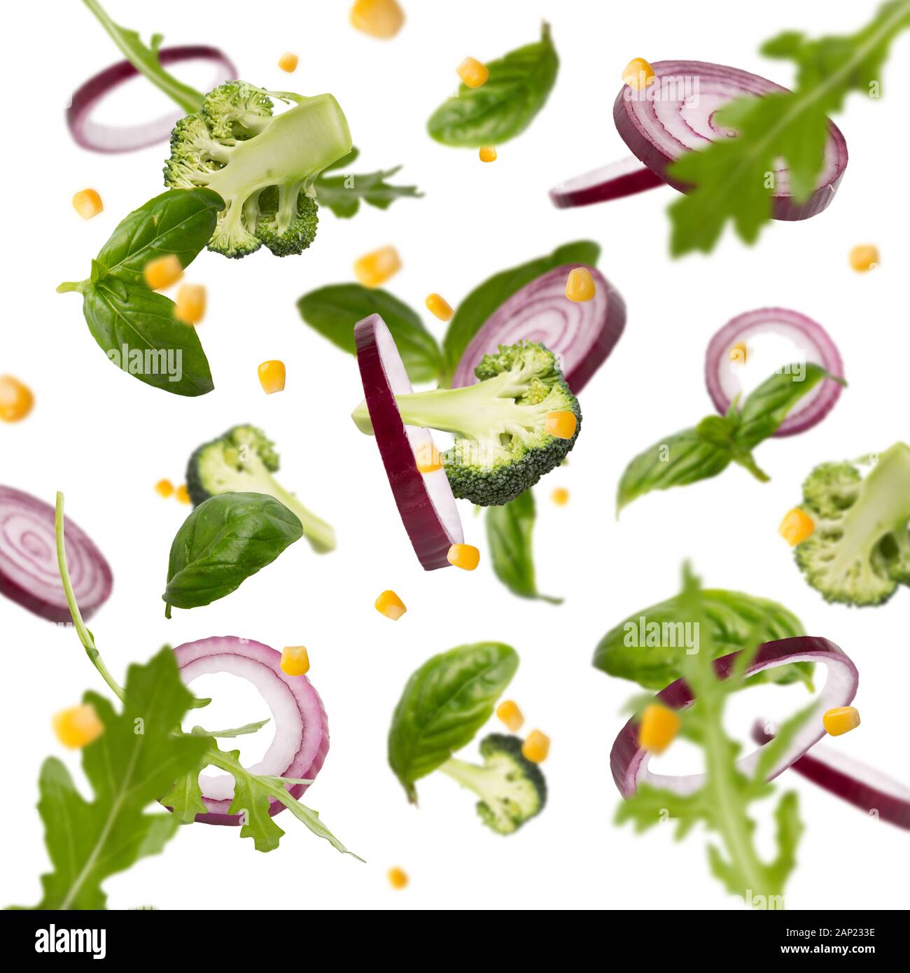 Flying healthy vegetables isolated on white background Stock Photo
