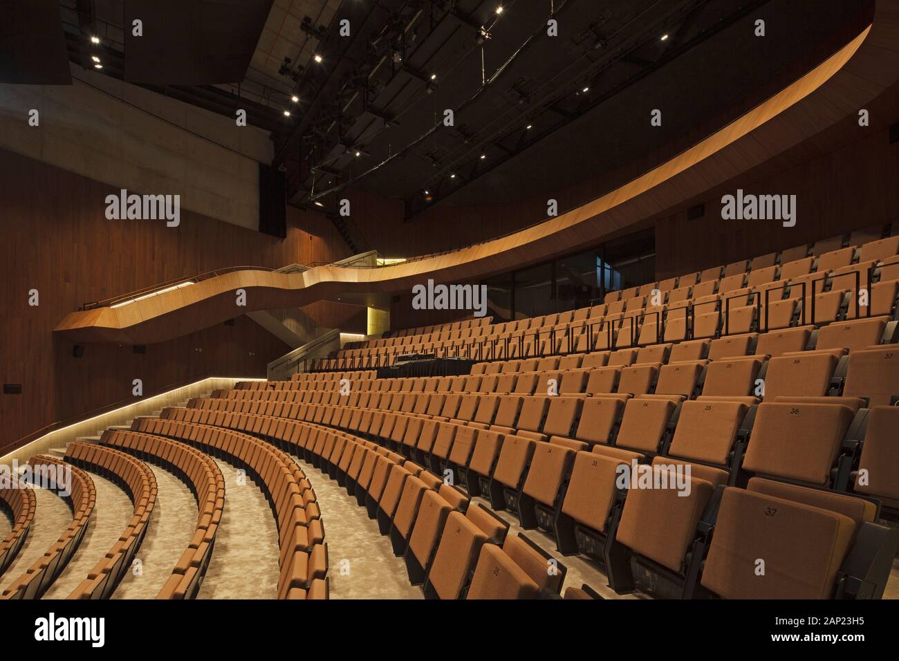 Seating in main auditorium. Cultuurcentrum De Factorij, Zaventem, Belgium. Architect: ebtca Architecten & Archiles architecten , 2017. Stock Photo