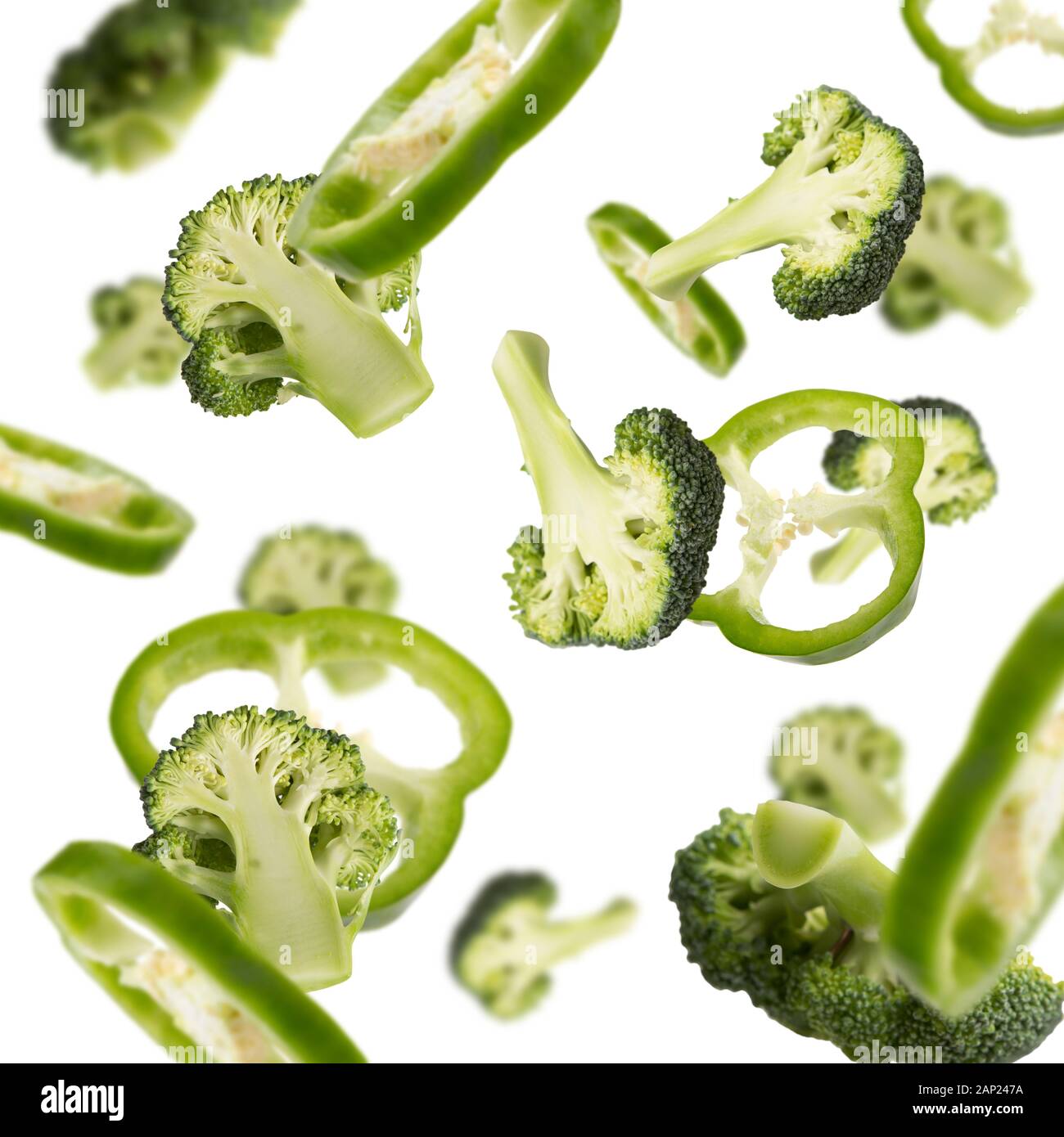 Flying broccoli slices isolated on white background Stock Photo