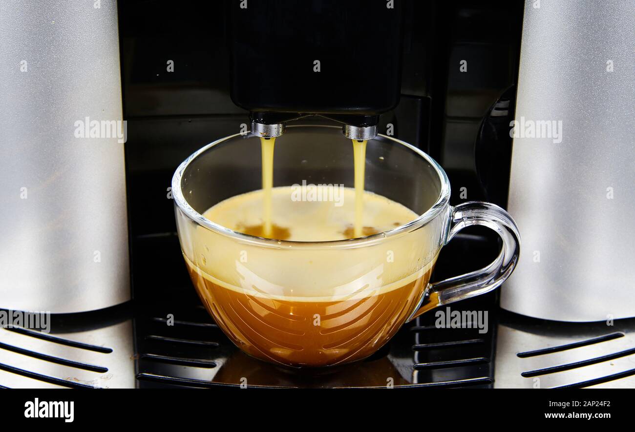 View on modern automatic coffee maker machine with isolated transparent